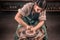 Stylish craftsman master making ceramic pot on the pottery wheel . Handmade.