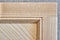 Stylish detail of furniture facade of veneer and solid ash