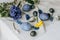 Stylish easter eggs and spring flowers on rustic wooden table. Happy Easter! Natural dye marble and blue eggs, purple hiacynt