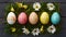 Stylish Easter flat lay painted eggs, spring flowers, rustic charm