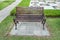 Stylish empty bench in park