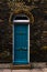 stylish entrance to a residential building, an interesting facade of the old brick arches above the door, a typical old English b