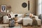 Stylish ethnic living room interior with design modular sofa, wooden stool, moroccan shelf, carpet decor, a lot of decoration.