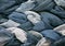 Stylish fabric background of the many braids`s laced in blue jea