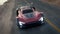 Stylish Futuristic Electric Red Sports Car Fast Driving at High Speed Highway 4k