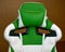 Stylish gaming chair. White and green leather chair. Chair for eSports players
