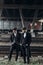 Stylish gangsters men, posing on background of railway. england