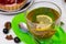 Stylish glass cup of spicy lemon tea