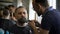 Stylish hair salon, barber Empozantny engaged beard respectable businessman.