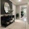 Stylish hallway interior with large mirror