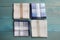 Stylish handkerchiefs on light blue wooden table, flat lay