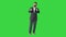 Stylish handsome bearded man thumbs-up on a Green Screen, Chroma Key.