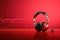 Stylish headphones with pads on red color background