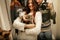 Stylish hipster couple adopted homeless sweet little kitten and