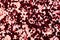 Stylish holographic glitter background in attractive red tone for Christmas design.