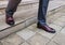 Stylish image of a man, feet in shoes close-up