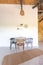 Stylish kitchen interior design. white walls and wooden decoration. beautiful hammock and high windows