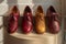 Stylish leather shoes in vibrant colors in the store, generative ai
