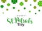 Stylish lettering of Happy St. Patrick`s Day on clover leaves decorated white background.