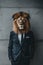 Stylish lion in business attire at office with copy space on plain wall, professional concept