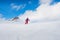 Stylish male athlete snowboarder rides on a blackboard on the sn