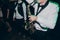 Stylish man playing on saxophone. hands on saxophone at wedding reception ceremony performing blues. live jazz music at party or