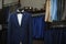 Stylish men`s suit. Men`s jacket on a mannequin. Men`s Clothing. Mannequins in the window of the boutique. Clothing store. Shoppin