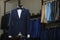 Stylish men`s suit. Men`s jacket on a mannequin. Men`s Clothing. Mannequins in the window of the boutique. Clothing store. Shoppin