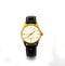 Stylish Men's and women's steel gold watches with black leather strap on white background.