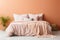 Stylish minimalist peach fuzz bedroom with bed, interior design with natural daylight illumination