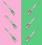 Stylish minimalistic drawing of Art brushes on a two-tone pink-green background