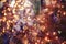 Stylish modern purple christmas tree on background of golden lights illumination bokeh, fairytale decoration. Atmospheric magic