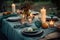 stylish outdoor table setting with chargers, candles, and cloth napkins