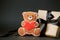 Stylish papercraft gift box and cookies bear with red heart, Concept of seasonal february Saint Valentine`s day, mother day, love