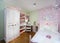 Stylish pink bedroom with wardrobe