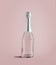 Stylish pink bottle of champagne at pink background. Fancy drink