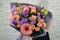 Stylish pink bouquet on a white background.