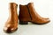 Stylish real leather ankle boots isolated on a whte background.