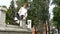 Stylish redhead man relaxing in the park. Summer