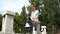 Stylish redhead man relaxing in the park. Summer