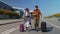 Stylish retired family couple granny grandfather walking with luggage suitcase bags to airport hall