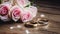 Stylish rings, flowers on wooden table background. Letters from the bride and groom