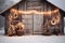 Stylish rustic cozy wooden farmhouse, decorated with Christmas lights. Merry Christmas. Happy holidays