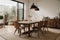 Stylish rustic interior of dining room with walnut wooden table, retro chairs, decoration, dried flower in vase in minimalist home