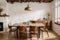 Stylish rustic interior of dining room with walnut wooden table, retro chairs, decoration, dried flower in vase in minimalist home