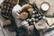 Stylish rustic still life with cheeses and different kinds of bread in beige warm colors with craft napkin used as a