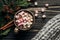 Stylish rustic winter flat lay of cup with colorful marshmallows