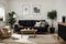 Stylish Scandic living room interior - sofa, armchair, coffee table, plants in pots, lamp, home decorations. Cozy Autumn. Modern c