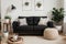 Stylish Scandic living room interior - sofa, armchair, coffee table, plants in pots, lamp, home decorations. Cozy Autumn. Modern c