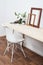 Stylish scandinavian interior design, white workspace